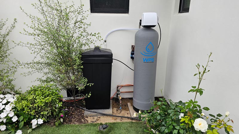 Water softener with clack WS125 valve installed outside